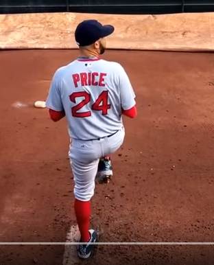 Pitch mechanics leg lift top back view image