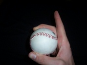 Pitching grip curveball with index finger up image